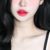 周莉亜